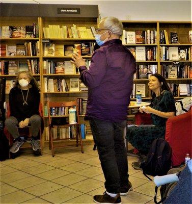 Kia Corthron arriving at Revolution Books Holiday Party about to read from her new book "Moon and the Mars." Everybody loved her reading.