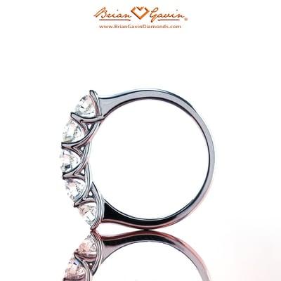 The beauty of the trellis prong setting of the 5 stone diamond ring by Brian Gavin