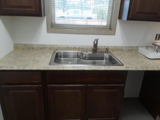 A kitchenette that was installed in a basement