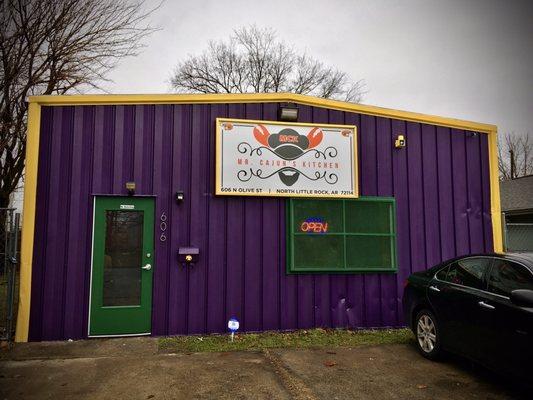 Marci Gras color themed storefront. (Sign made @ Fastsigns NLR)