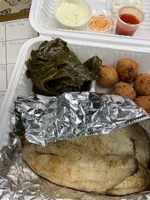 Broiled tilapia, greens, and hush puppies