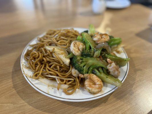 Broccoli and shrimp with chow mein noodles.