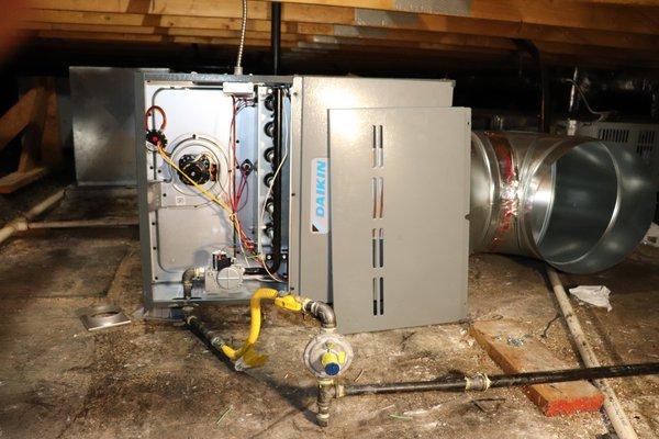 Daikin gas furnace getting installed at a high school