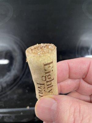 Glass or sand granules on the cork from a bottle of Eighty Four Albariño