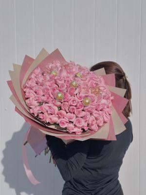 A beautiful arrangement of 100 wrapped pink and red roses , perfect for that special person.