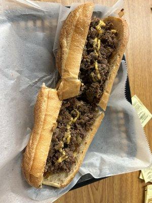 Steak and cheese added grilled onions amazing and the sub roll soft and delicious.