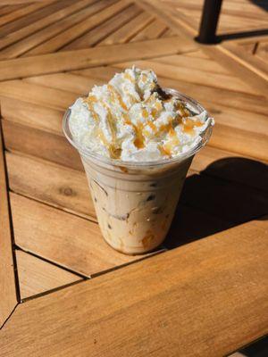 Beat the heat with our café frappe--icy, creamy, and topped with a swirl of whipped cream.