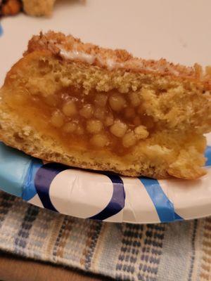 The filling is sweet and tangy bites of apples with a light icing on top and a crunchy crumble.