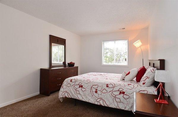 Bedroom with ample space for a large bed, frame and additional furniture