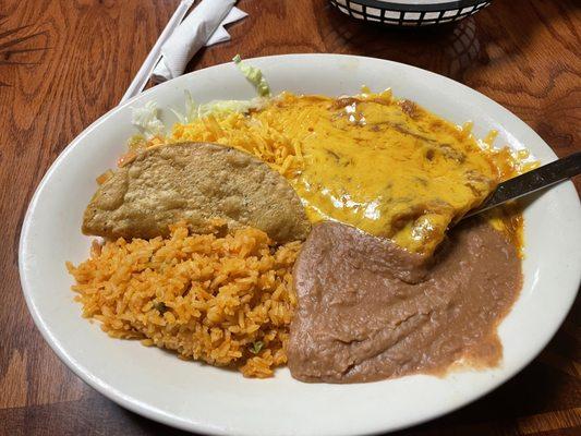 Cheese Enchilada with beef hard-shell taco. Full of flavor and beans/rice were DELICIOUS