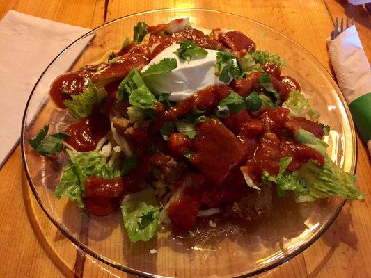 Navajo Taco made with fried bread, black beans, lettuce, and pork loin. Tasty!