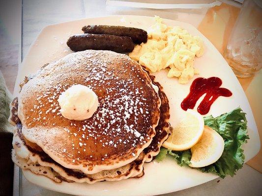 Pancake breakfast platter with the best sausage links in town and scrambled eggs