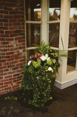 LaVassar Florists filled out existing planters to turn them into beautiful displays welcoming my wedding guests