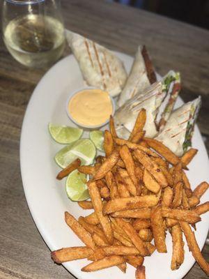 Fish tacos (yes it looks like a burrito lol) with sweet potato fries & a glass of pinōt grigio.