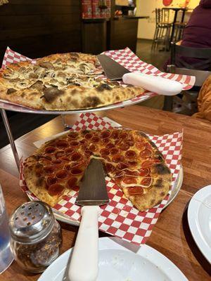 Pepperoni pizza, and sausage and mushroom pizza.