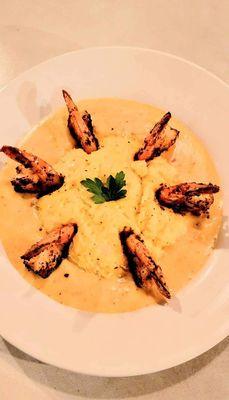 Shrimp and cheesy grits with our famous Tasso cream sauce