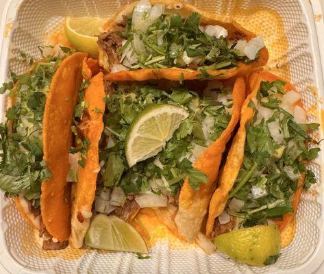 Quesa birria crunchy tacos dressed with onions, cilantro, lime, and salsa- so yummy!