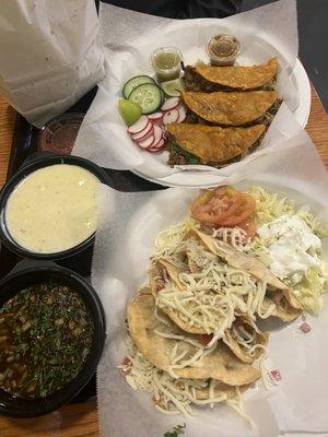 Chips and cheese dip, quesa-tacos and fried tacos with ground beef.  So good!