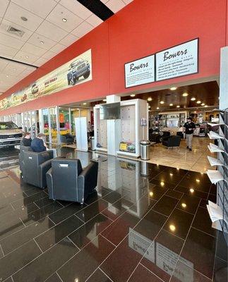 Waiting area, TVs and nice comfortable chairs