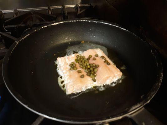 Salmon dinner with lemon and capers