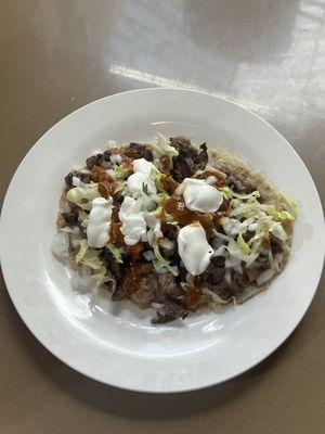 Huarache served with your choice of meat , al pastor , carne asada , chorizo or chicken