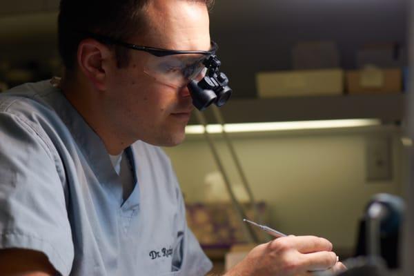 Dr. Recksiedler working in the on site dental lab.