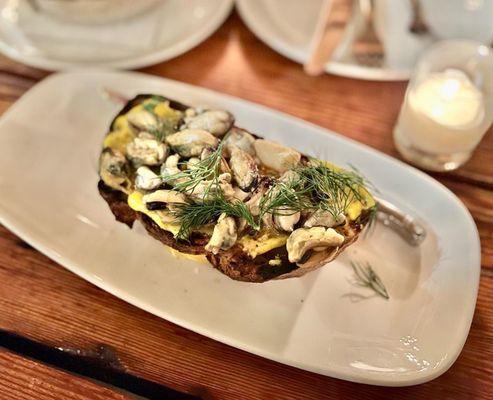 Totten Inlet Mussels Bruschetta, saffron aioli, garlic confit, dill, sea salt