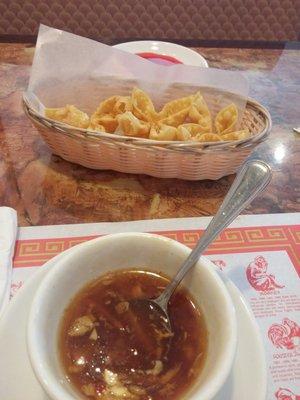 Hot sour soup,  1/2 order crab ragoon.