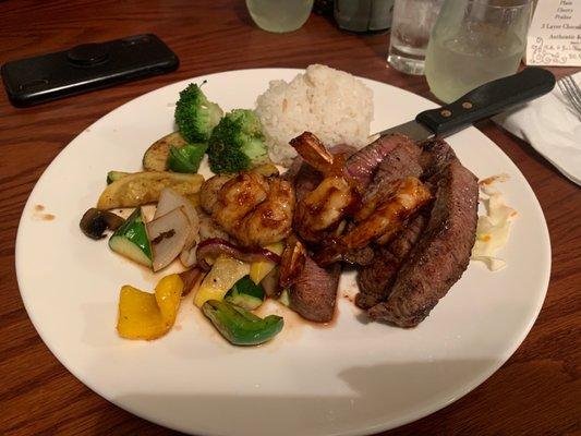 Steak and shrimp with white rice and grilled veggies