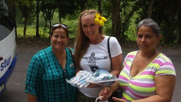 Handing out the toothbrushes, toothpaste and dental floss (at a grade school school for poor children in Cuba) that was donated by WD :-)