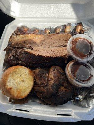 Combination Platter for 3 rib, chicken and brisket comes with two sides