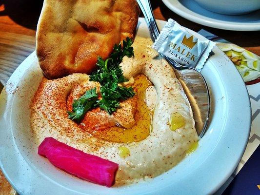 Hummus we filled with Olive Oil Love with HOT Puffy Bread straight outta the oven