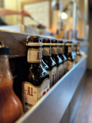 A row of A1 sauces with no caps