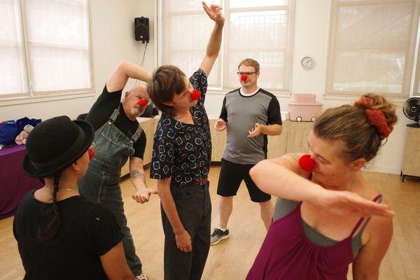 Students playing a clown game.