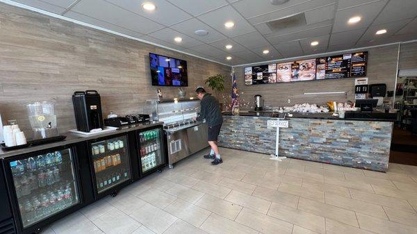 Front counter to place your order and left area to self serve drinks, soup and sauces