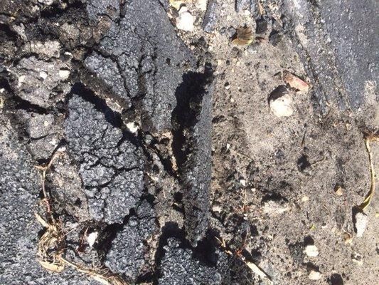 Crumbling Asphalt 2 months after installation.