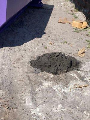 Leftover concrete dumped in our newly established residential community.  It was not hauled away, as we were told by the owner.