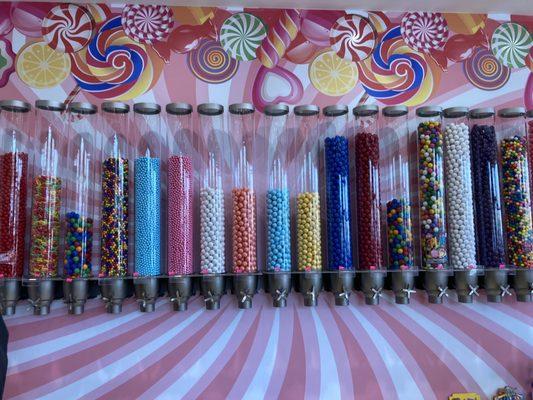 Wall of candy dispensers