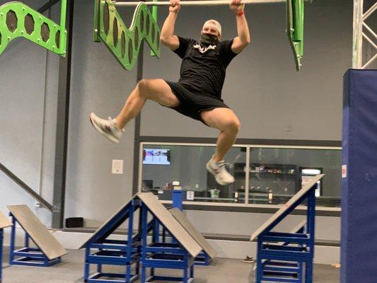 Flying through the race lane at Synergy Climbing And Ninja