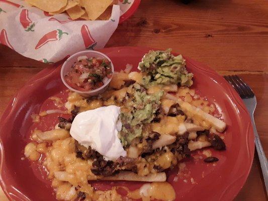 Asked for no guacamole, it's all over the plate. This tiny portion of fries with cheese and beef was $13.95!