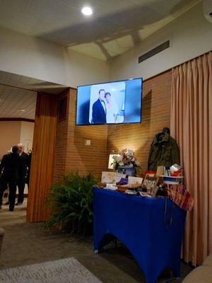 There are several screens in the seating area, in case families want to share photos.