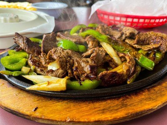 Steak Fajitas...you can still see the steam coming off of the steak.