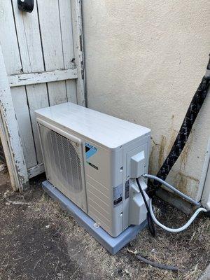 Outdoor mini split for a Daikin HVAC system.