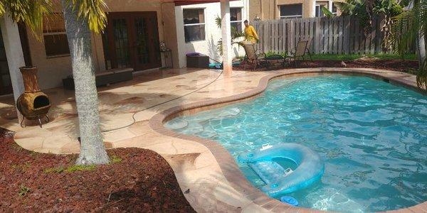 Pressure cleaning pool deck in Davie