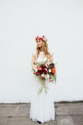 bride with her gorgeous bouquet and flower crown