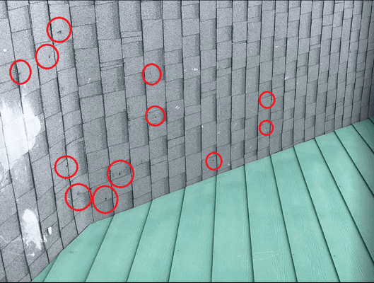 Circles indicate where nails were hammered in new shingles