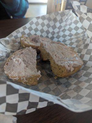 Multigrain bagel with huckleberry cream cheese