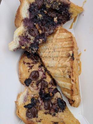 vegan peanut/almond butter & jelly sandwich blueberry jelly,chocolate chips,banana,panini pressed,vegan street fair