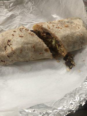 Carne asada burrito with everything. Delicious and filling.