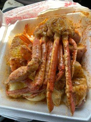 Snow crab, corn, potato and eggs covered in garlic gravy sauce!!!